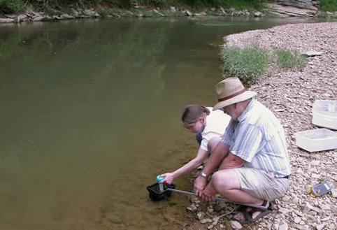 two people at pond