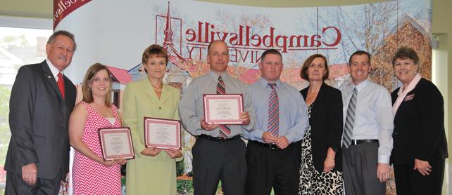 Taylor County School System teachers receive Campbellsville University Excellence in Teaching Awards from Dr. Brenda Priddy, dean of the School of Education, far left, and Dr. Frank Cheatham, vice president for academic affairs, far right. From left are: Brian Clifford, Taylor County Elementary School principal; Susan Kilby, assistant superintendent; Charles Higdon, Taylor County High School principal; Troy Wilson Young of Taylor County High School; Lori Lynn Schultz of Taylor County Middle School; and Brandi Graham of Taylor County Elementary School. (Campbellsville University Photo by Christina Kern)